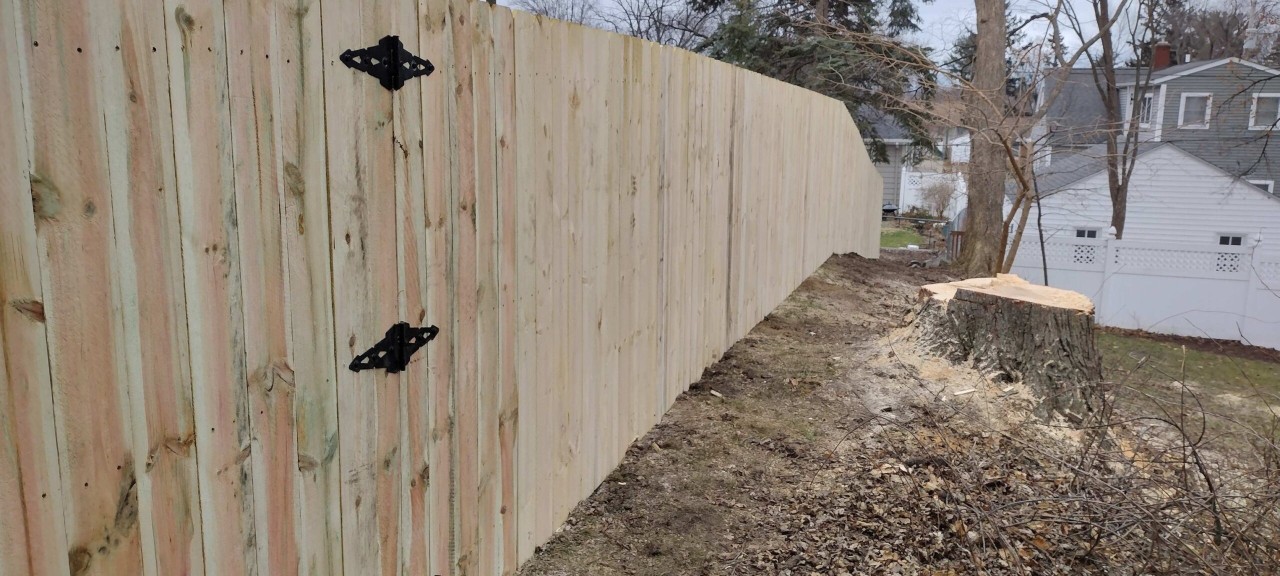 Residential wood privacy fence installation